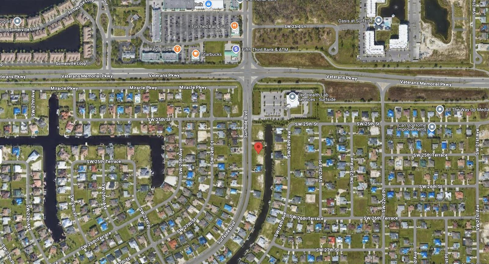 This is an aerial map view of a residential neighborhood in Cape Coral, Florida — 2513 Surfside Boulevard, FL 33914, FL