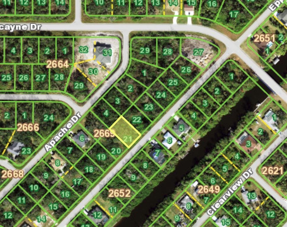 This is a map showing a highlighted vacant residential lot in a suburban neighborhood — 1189 EPPINGER DRIVE, PORT CHARLOTTE, FL