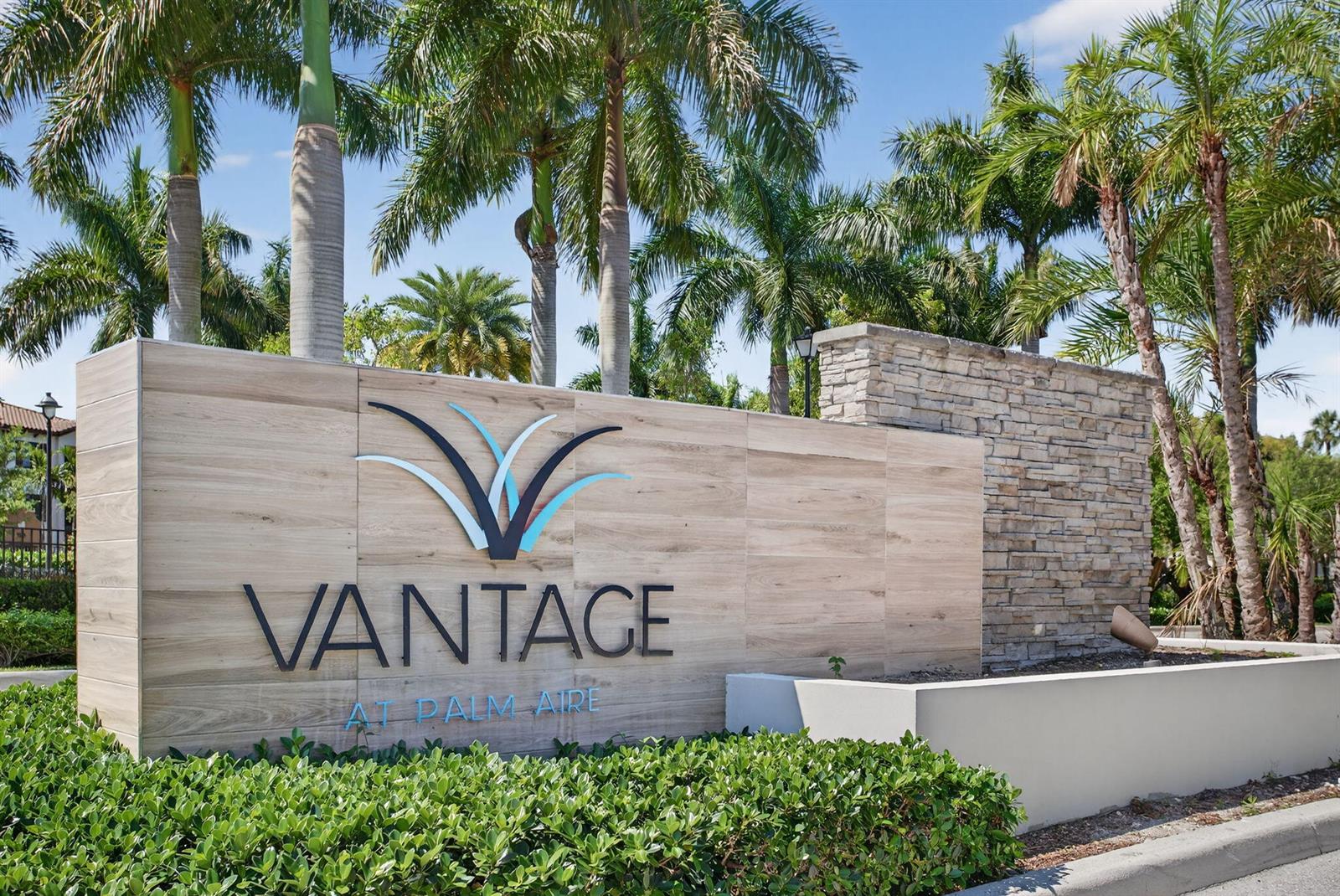 A sign for Vantage at Palm Aire stands in front of palm trees and landscaping — 325 NW 33rd Lane, Pompano Beach FL 33069, POMPANO BEACH, FL