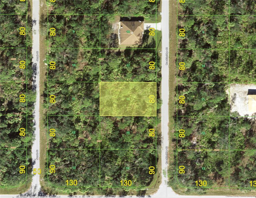 This is a satellite map view showing a highlighted vacant residential lot between two streets — 3153 BRECKINRIDGE STREET, PORT CHARLOTTE, FL