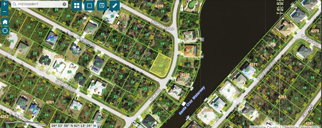 This is a satellite map view showing residential lots and a waterway in a neighborhood — 13468 RAYBURN LANE, PORT CHARLOTTE, FL