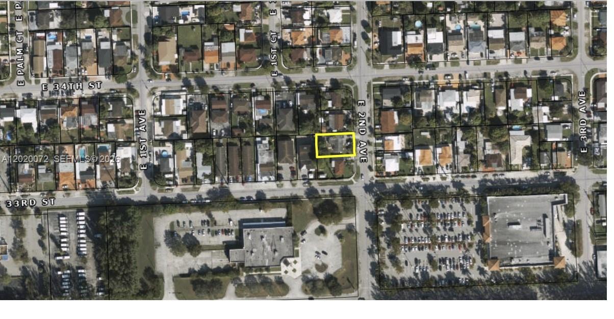 This aerial map shows a residential property highlighted in yellow within a suburban neighborhood — 3350 E 2nd Ave, Hialeah FL 33013, HIALEAH, FL