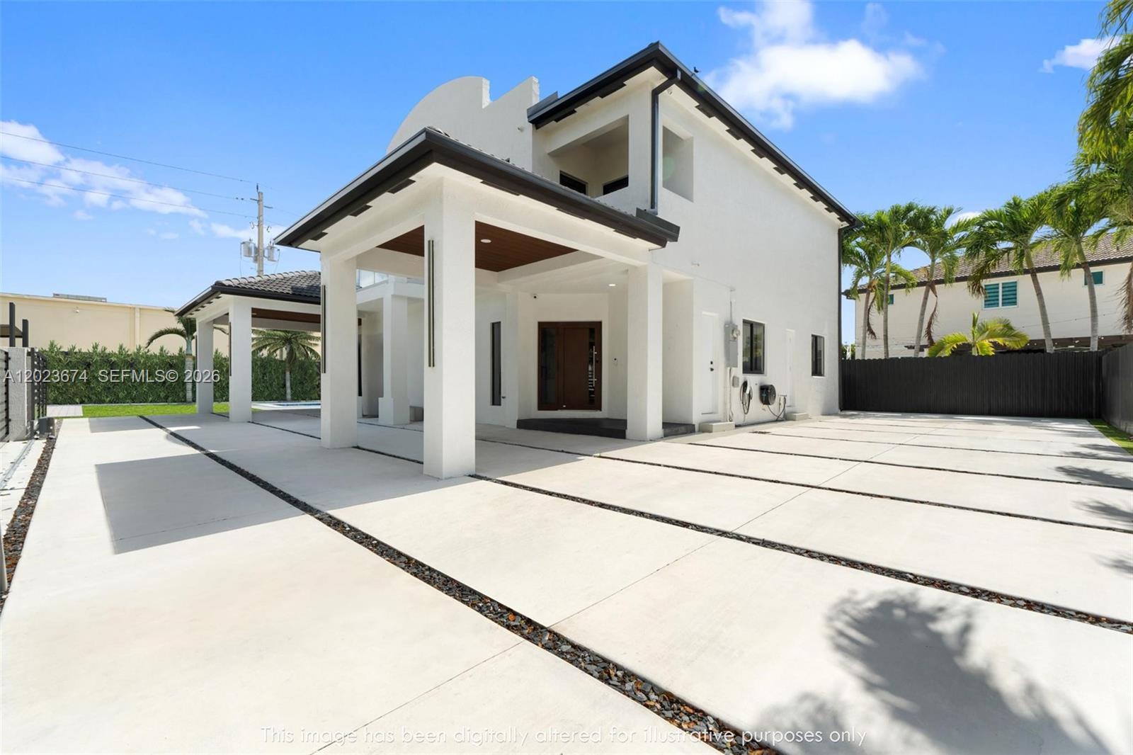 A white two-story house with a covered entryway and a large concrete driveway — 4014 SW 144th Pl, Miami FL 33175, MIAMI, FL