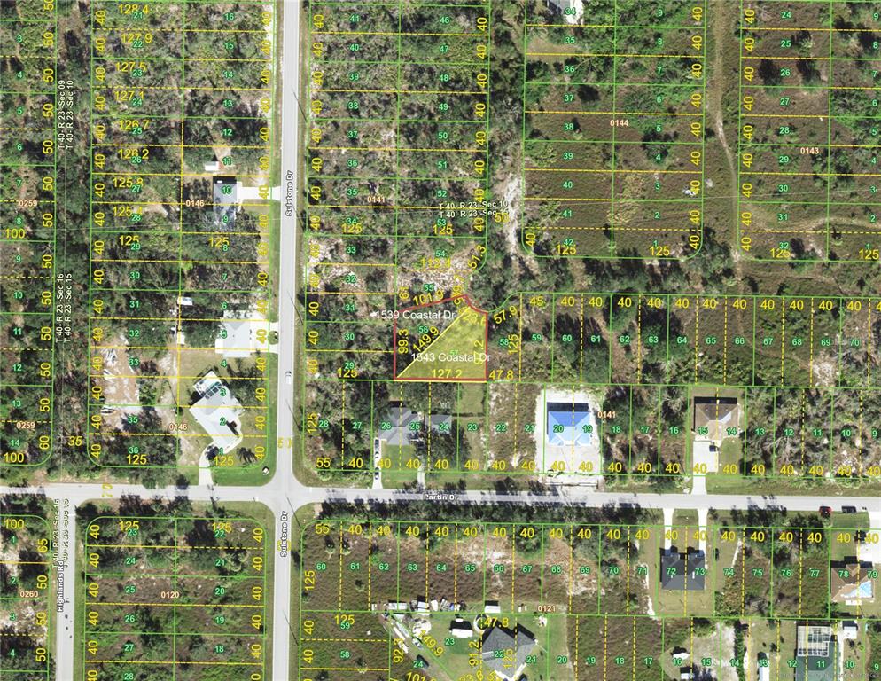 This is a satellite map showing property lot lines and parcel numbers in a residential area — 1543 & 1539 COASTAL DRIVE, PUNTA GORDA, FL