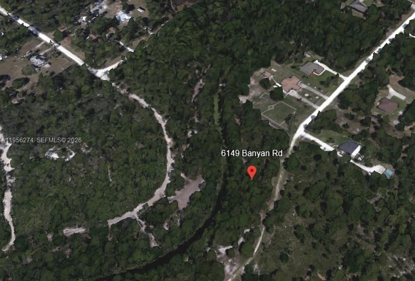 This is an aerial map view of a wooded residential lot — 6149 BANYAN RD, Sebring FL 33875, SEBRING, FL