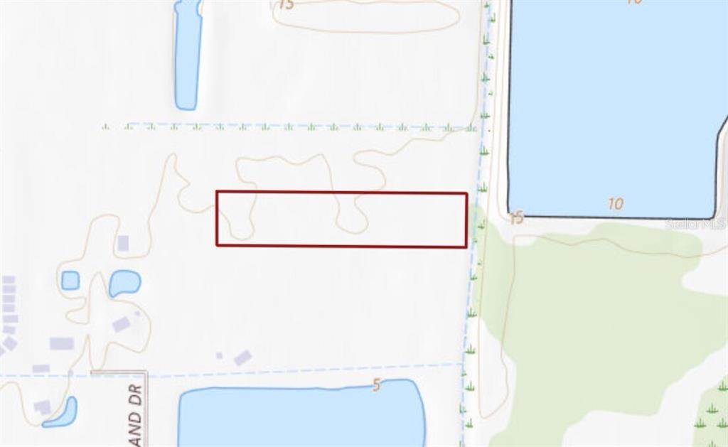 This is a map showing a rectangular parcel of land outlined in red — 3317 ROWLAND DRIVE UNIT Tract F, PUNTA GORDA, FL