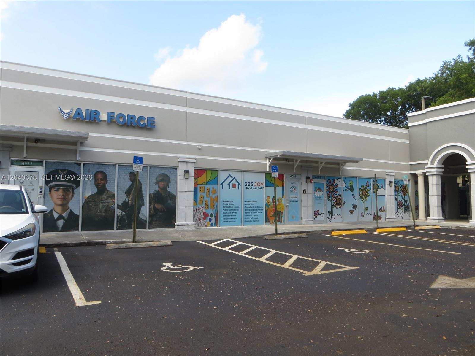 The exterior of a commercial building features an Air Force office and an adult day care — 4081 SW 152nd Ave, Miami FL 33185, MIAMI, FL
