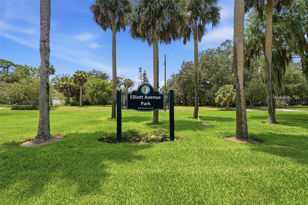 A sign for Elliott Avenue Park stands in a grassy area surrounded by palm trees — 421 ELLIOTT AVENUE, SANFORD, FL
