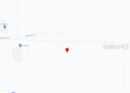 This is a map showing a property location marked with a red pin — 7157 WINDWOOD LANE, MILTON, FL
