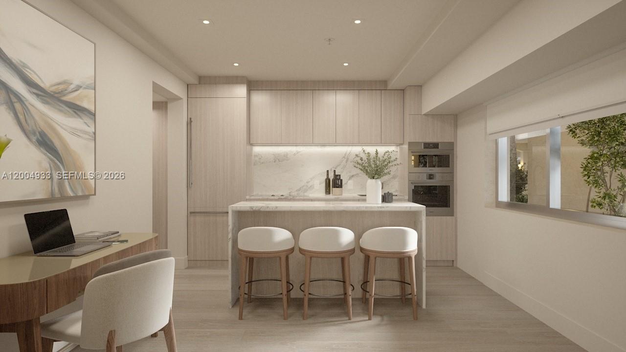 This rendering shows a modern kitchen with light wood cabinetry, marble backsplash, and island seating — 260 Collins Ave # 105, Miami Beach FL 33139, MIAMI BEACH, FL