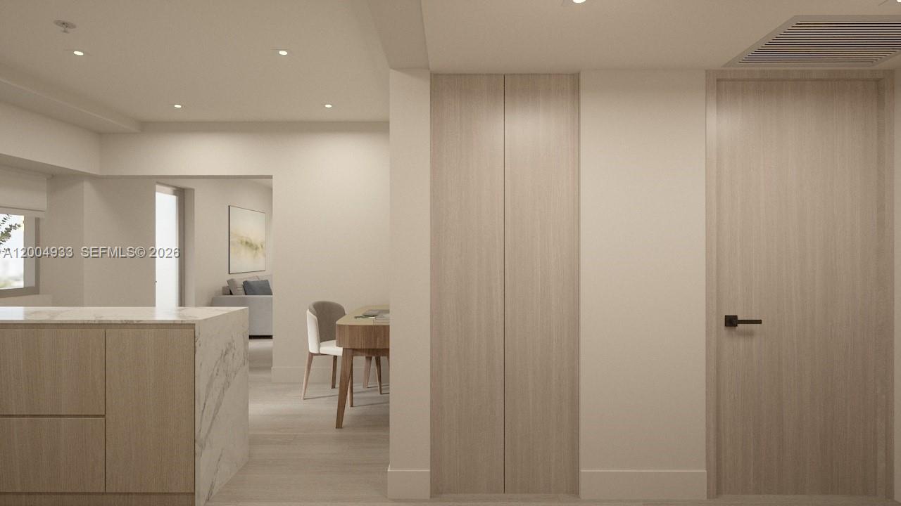 This is a rendering of a modern interior featuring light wood cabinetry and doors — 260 Collins Ave # 105, Miami Beach FL 33139, MIAMI BEACH, FL
