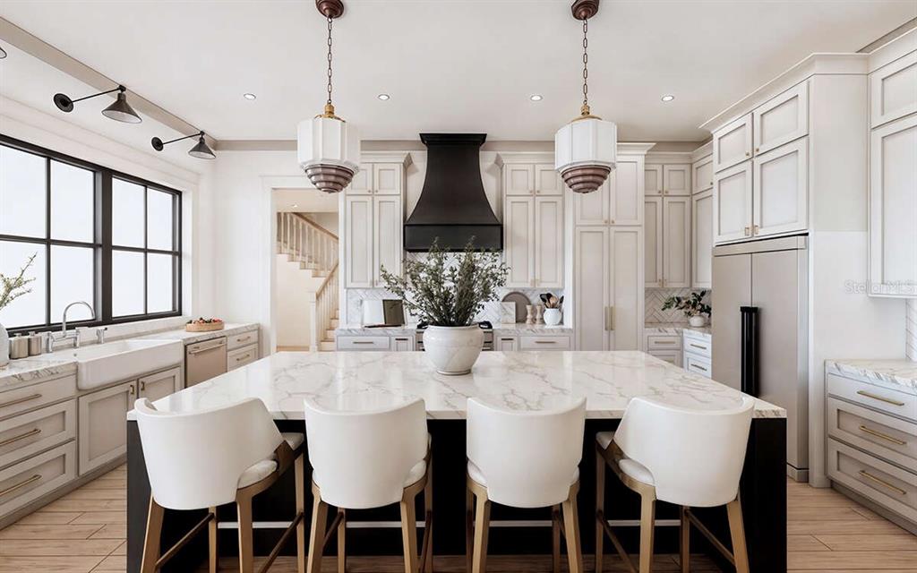 A modern kitchen features a large marble-topped island, white cabinetry, and a black range hood — 4302 ROYAL SKY COURT, BROOKSVILLE, FL