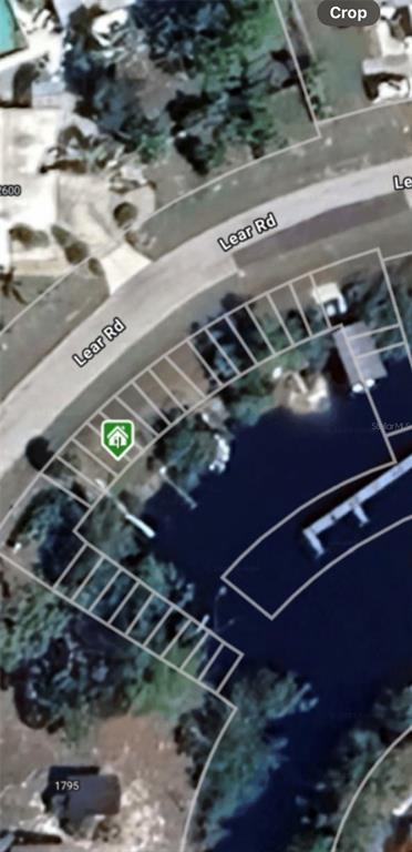 This aerial map shows a residential property lot along a curved road and waterfront — 2613 LEAR ROAD B LOT 14, ENGLEWOOD, FL