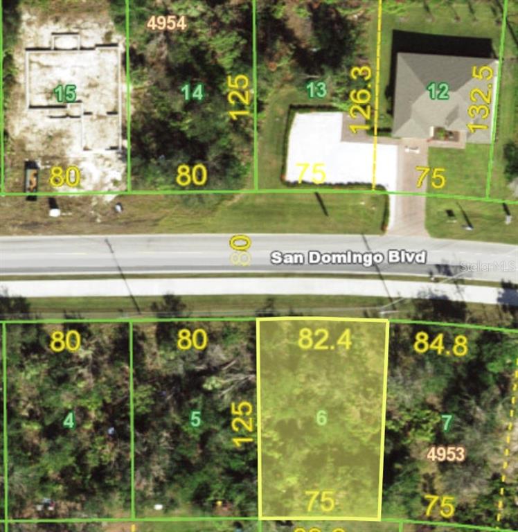 This is a map showing a vacant lot highlighted in yellow along San Domingo Blvd — 14379 SAN DOMINGO BOULEVARD, PORT CHARLOTTE, FL
