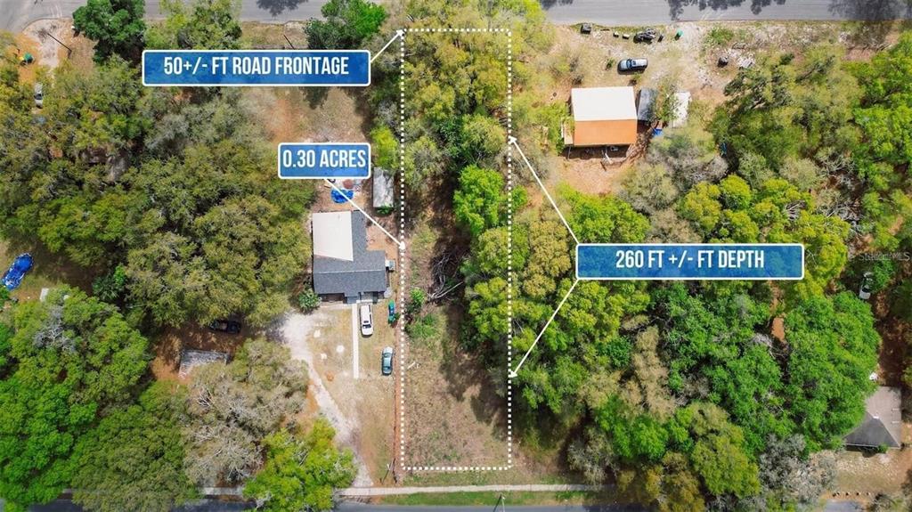 An aerial view shows a rectangular plot of land with dimensions and acreage marked — LAWRENCE ST, WILDWOOD, FL