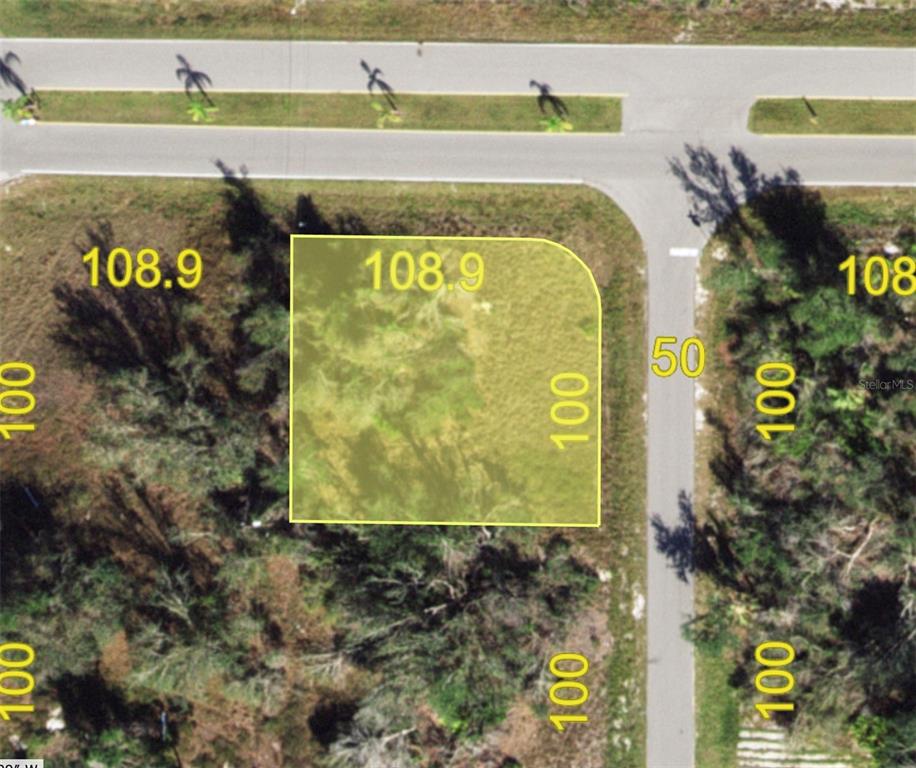 This is an aerial map showing a vacant rectangular lot with a curved corner — 273 BOLENDER STREET, PUNTA GORDA, FL