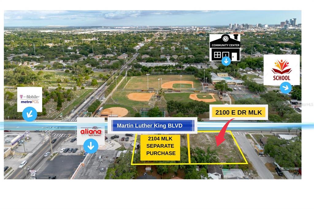 An aerial view shows a vacant lot for sale next to a commercial street — 2100 E DR MLK, TAMPA, FL