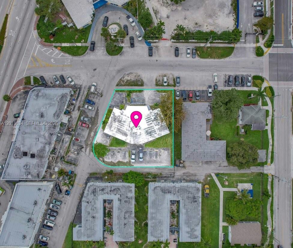 This is an aerial view of a commercial property lot outlined in teal — 1747 NE 124th St, North Miami FL 33181, NORTH MIAMI, FL
