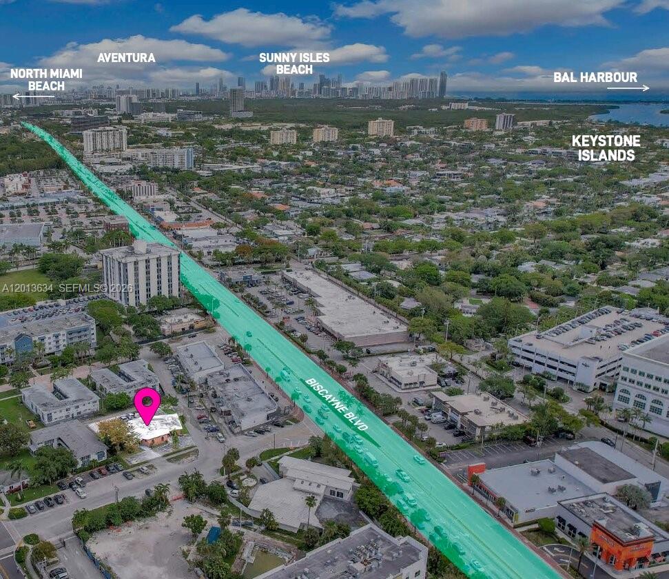 An aerial view shows a property marked with a pin along Biscayne Boulevard in Florida — 1747 NE 124th St, North Miami FL 33181, NORTH MIAMI, FL