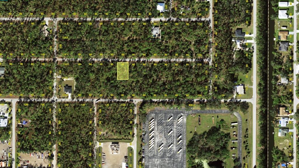 This is an aerial map showing a highlighted rectangular plot of land in a wooded area — 17435 ORION AVENUE, PORT CHARLOTTE, FL