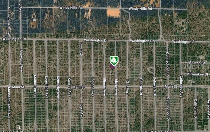 This is an aerial map showing a plot of land marked with a green icon — LOT 14 15 16 AND 17 IDAHO AVENUE, HAWTHORNE, FL