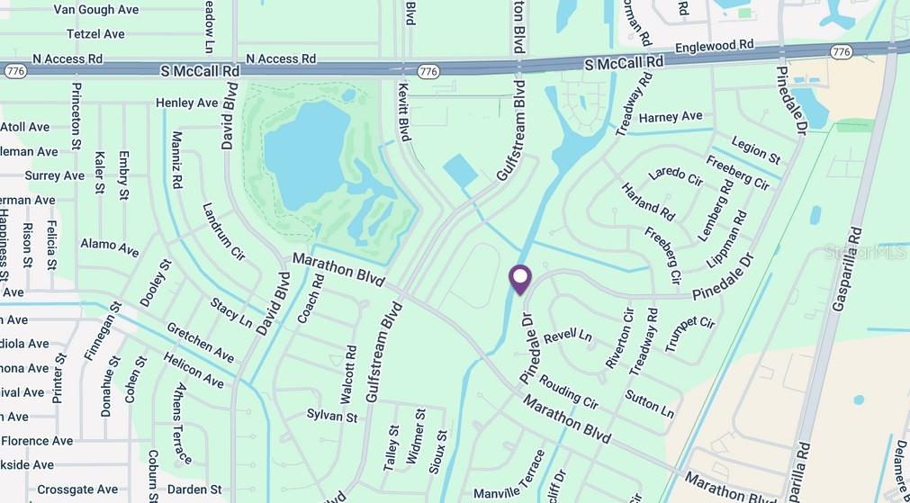 This is a map showing streets and residential areas in a neighborhood — 7529 PINEDALE DRIVE, PORT CHARLOTTE, FL