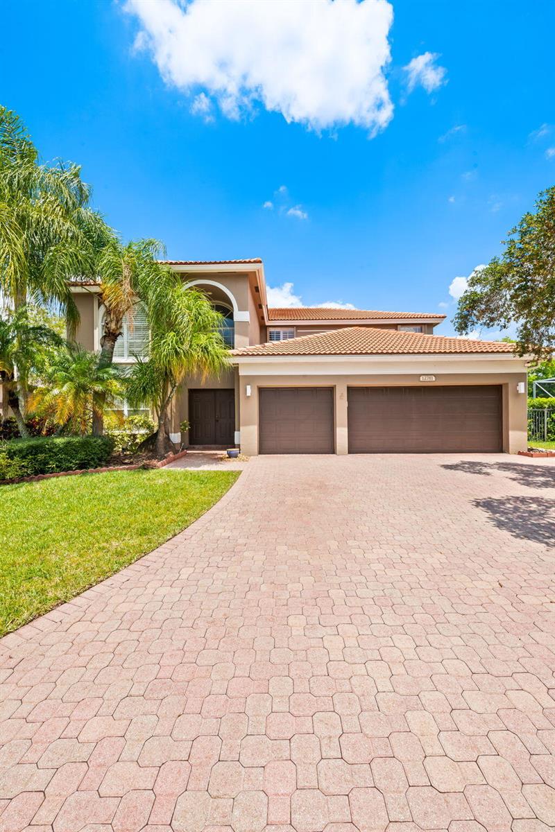 An aerial view shows a residential house with a tiled roof, pool, and driveway — 12781 Yardley Drive, Boca Raton FL 33428, BOCA RATON, FL