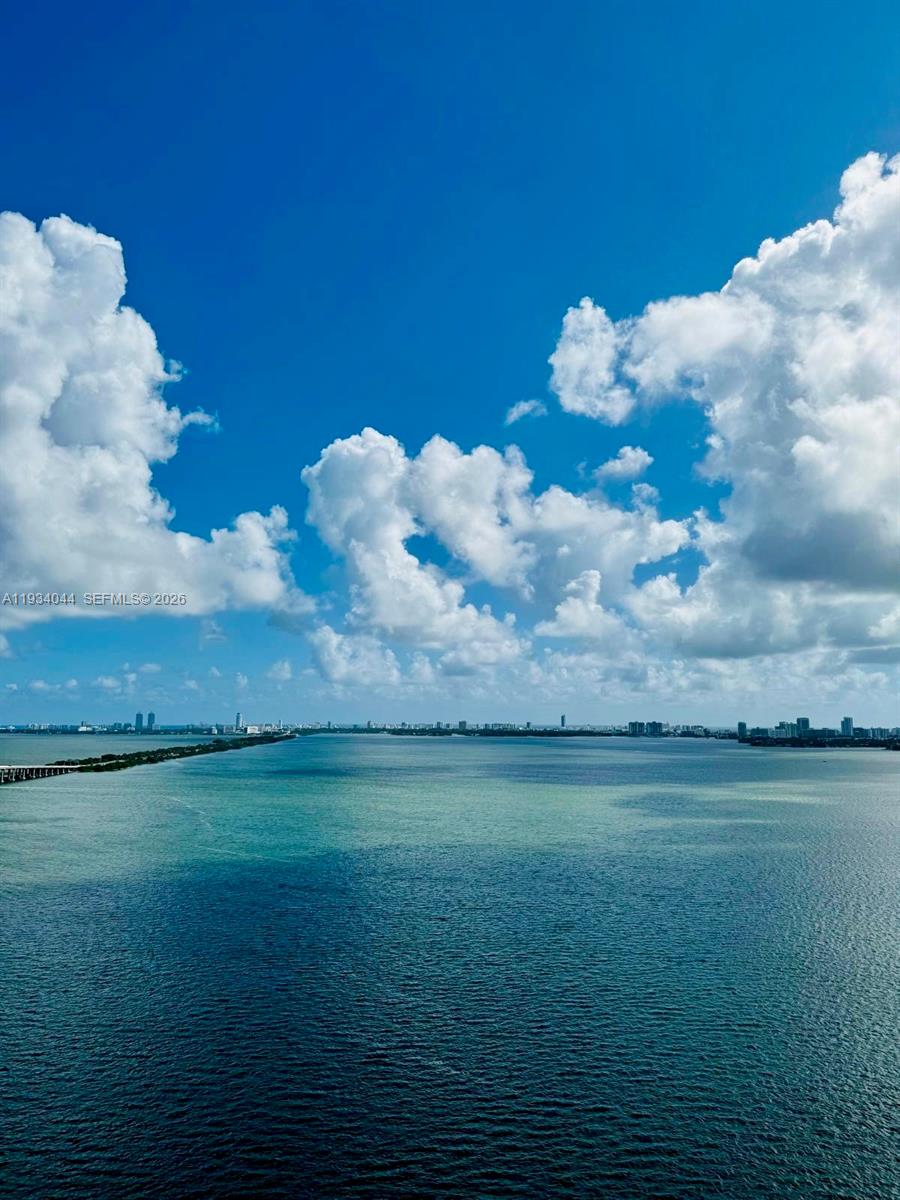 A high-angle view of a large body of water under a bright, cloudy sky — 480 NE 31st St # 3405, Miami FL 33137, MIAMI, FL