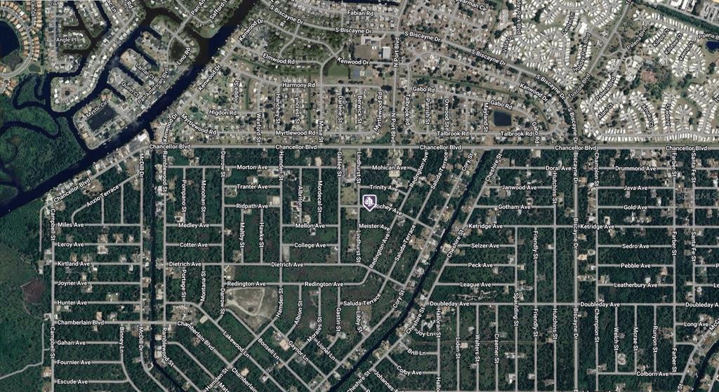 This is an aerial map view of a residential neighborhood with a grid of streets — 12507 RICHEY AVENUE, PORT CHARLOTTE, FL
