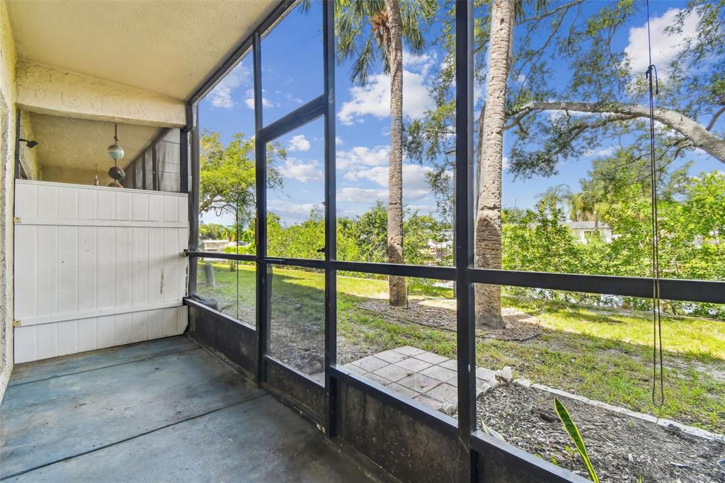 9115 TUDOR DRIVE UNIT E106, TAMPA, FL — photo 3 of 30