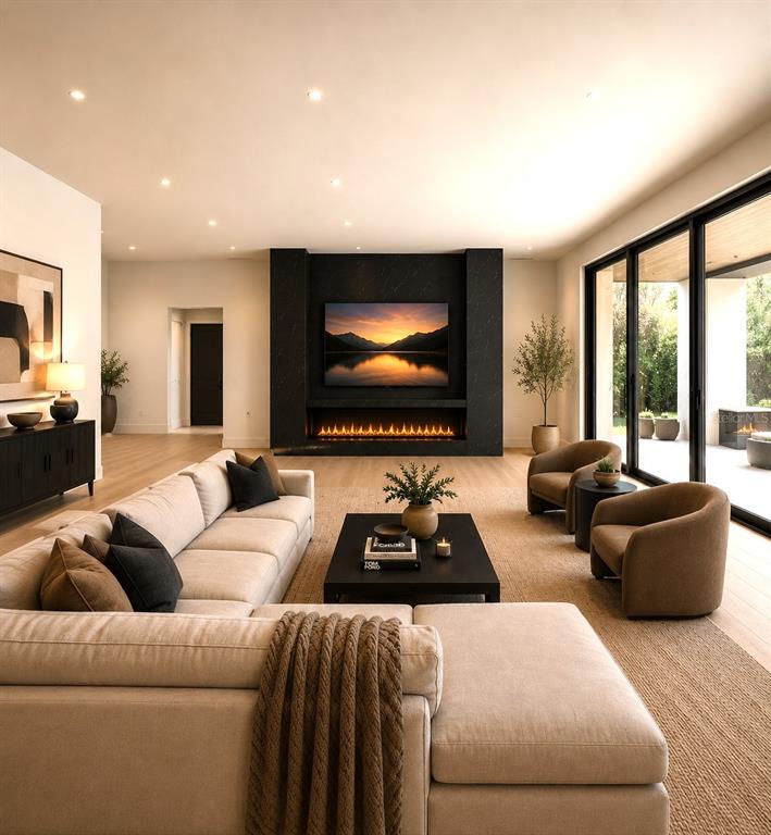 This is a rendering of a modern living room featuring a black fireplace and large windows — 1011 S MORRISON COURT, TAMPA, FL