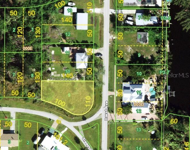 This is an aerial map showing property lot lines and parcel numbers along a street — 201 DARST AVENUE, PUNTA GORDA, FL