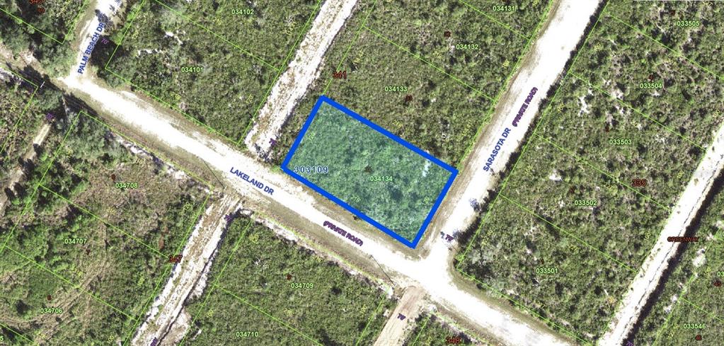 This is an aerial map showing a highlighted rectangular plot of land at a road intersection — LAKELAND DRIVE, INDIAN LAKE ESTATES, FL