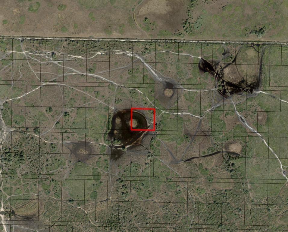 This aerial map shows a rural landscape with several dark, circular depressions and property boundaries — 0 NW 316th Street, Okeechobee FL 34972, OKEECHOBEE, FL