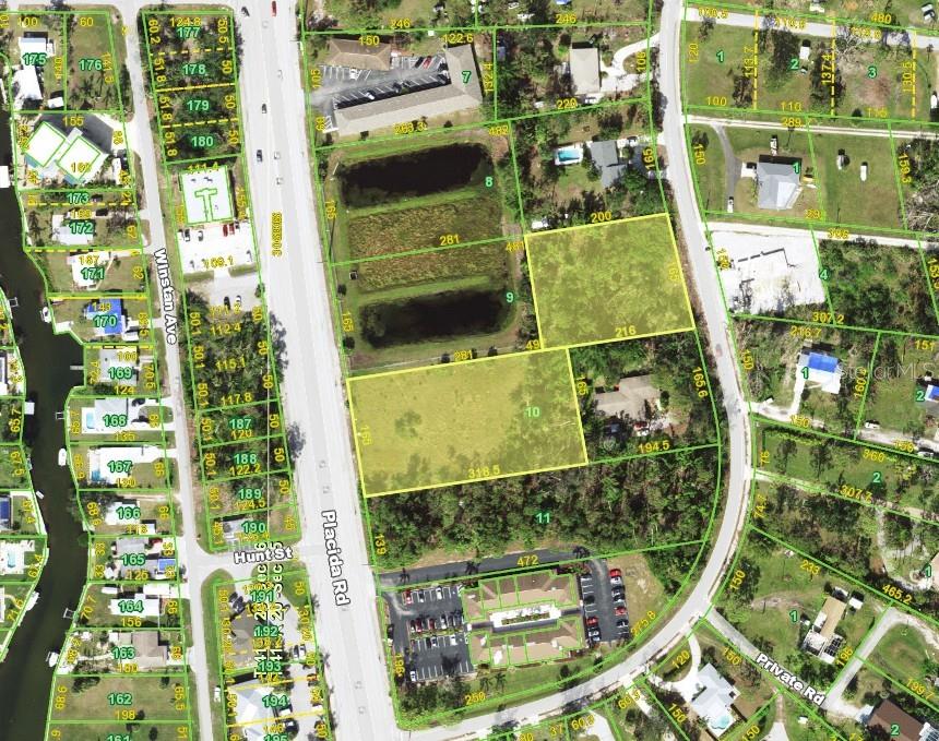 This is an aerial map showing land parcels, roads, and surrounding residential and commercial properties — 1701 PLACIDA ROAD, ENGLEWOOD, FL