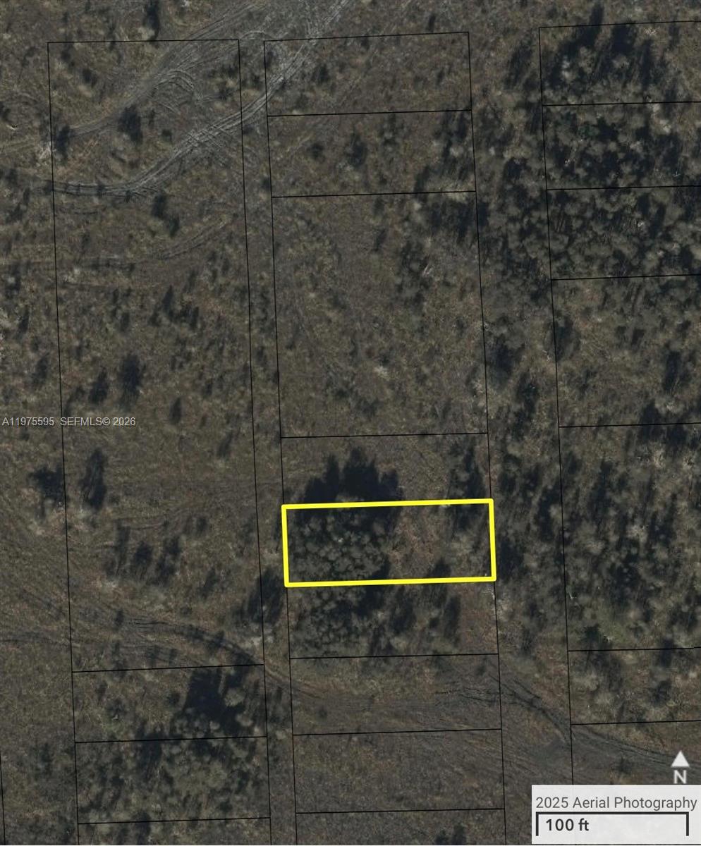 This is an aerial map showing a rectangular plot of land highlighted in yellow — 40 sw 162ave, Miami FL 33185, MIAMI, FL