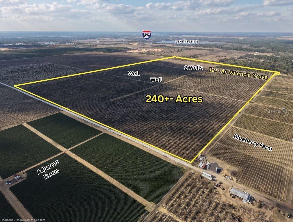 An aerial view shows a large, yellow-outlined agricultural property with multiple wells and groves — 8923 + 6611 E TWITTY ROAD, SEBRING, FL