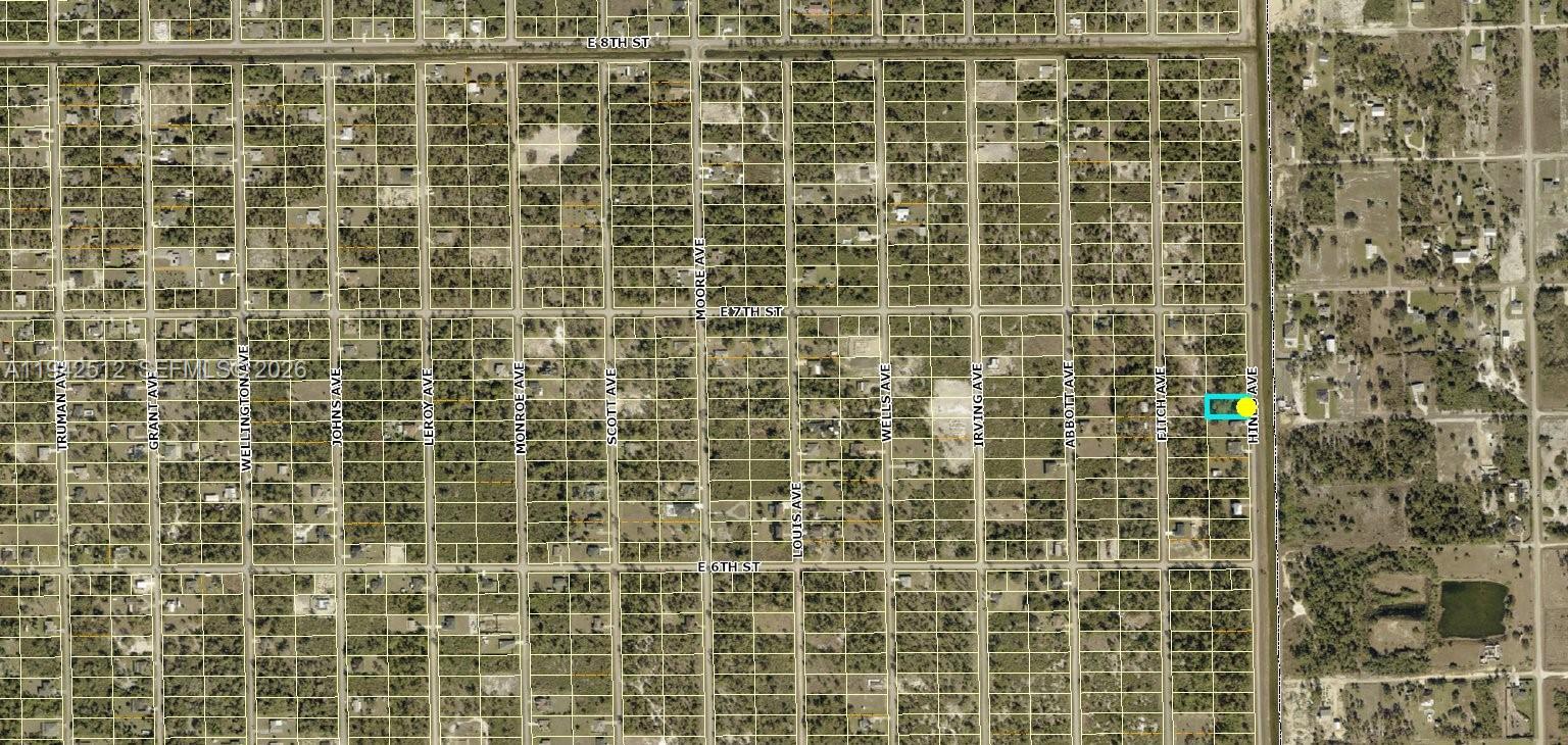 This is an aerial map showing a grid of land parcels with a highlighted property — 607 Hines, Lehigh Acres FL 33972, LEHIGH ACRES, FL
