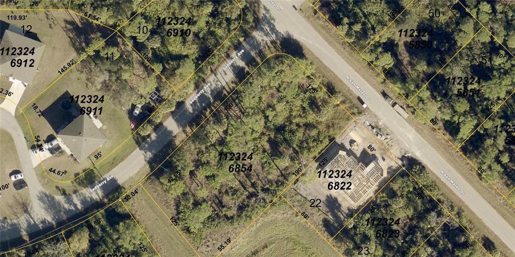 This is an aerial map showing property lot lines and parcel numbers for a neighborhood — N SAN MATEO DRIVE, NORTH PORT, FL