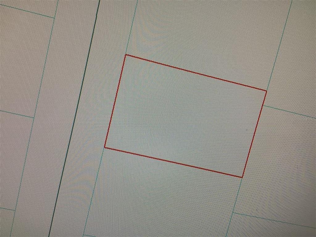 This image is a digital map showing a rectangular property parcel outlined in red — 0 SW 34TH COURT ROAD, OCALA, FL
