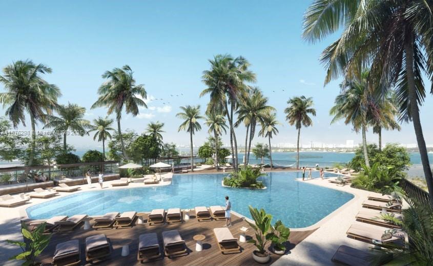 This is a rendering of an outdoor swimming pool area surrounded by palm trees and lounge chairs — 601 NE 1st Ave # 1606, Miami FL 33132, MIAMI, FL