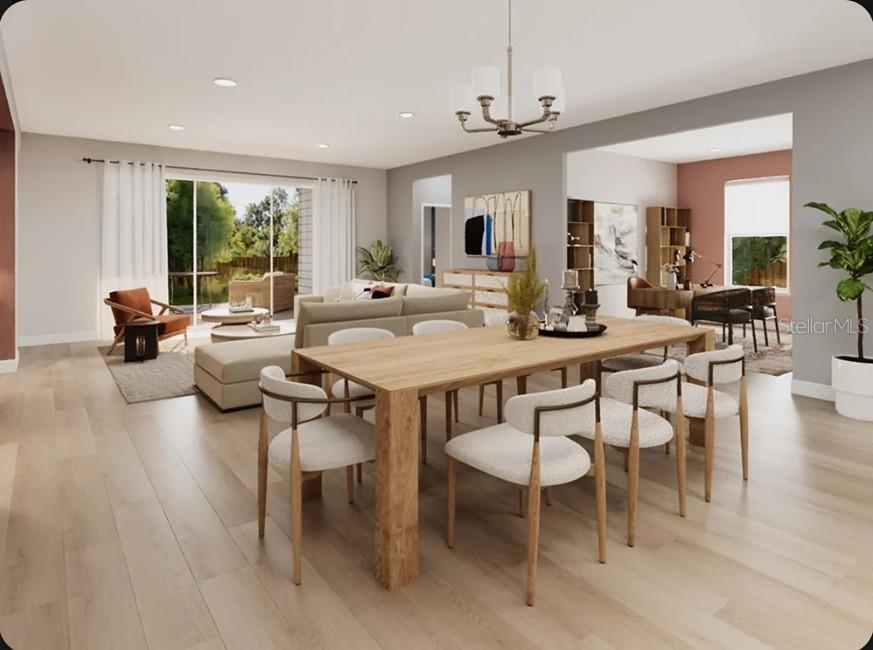 This is a digital rendering of an open-concept dining and living area with wood flooring — 11341 BOURBON ROSE CIRCLE, WINTER GARDEN, FL