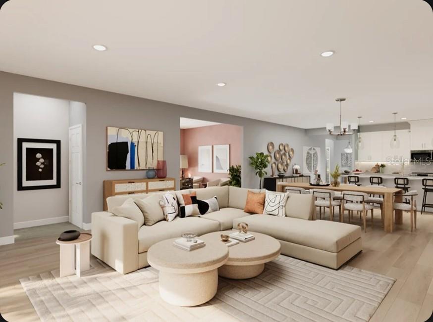 This is a digital rendering of an open-concept living and dining area with neutral furniture — 11341 BOURBON ROSE CIRCLE, WINTER GARDEN, FL