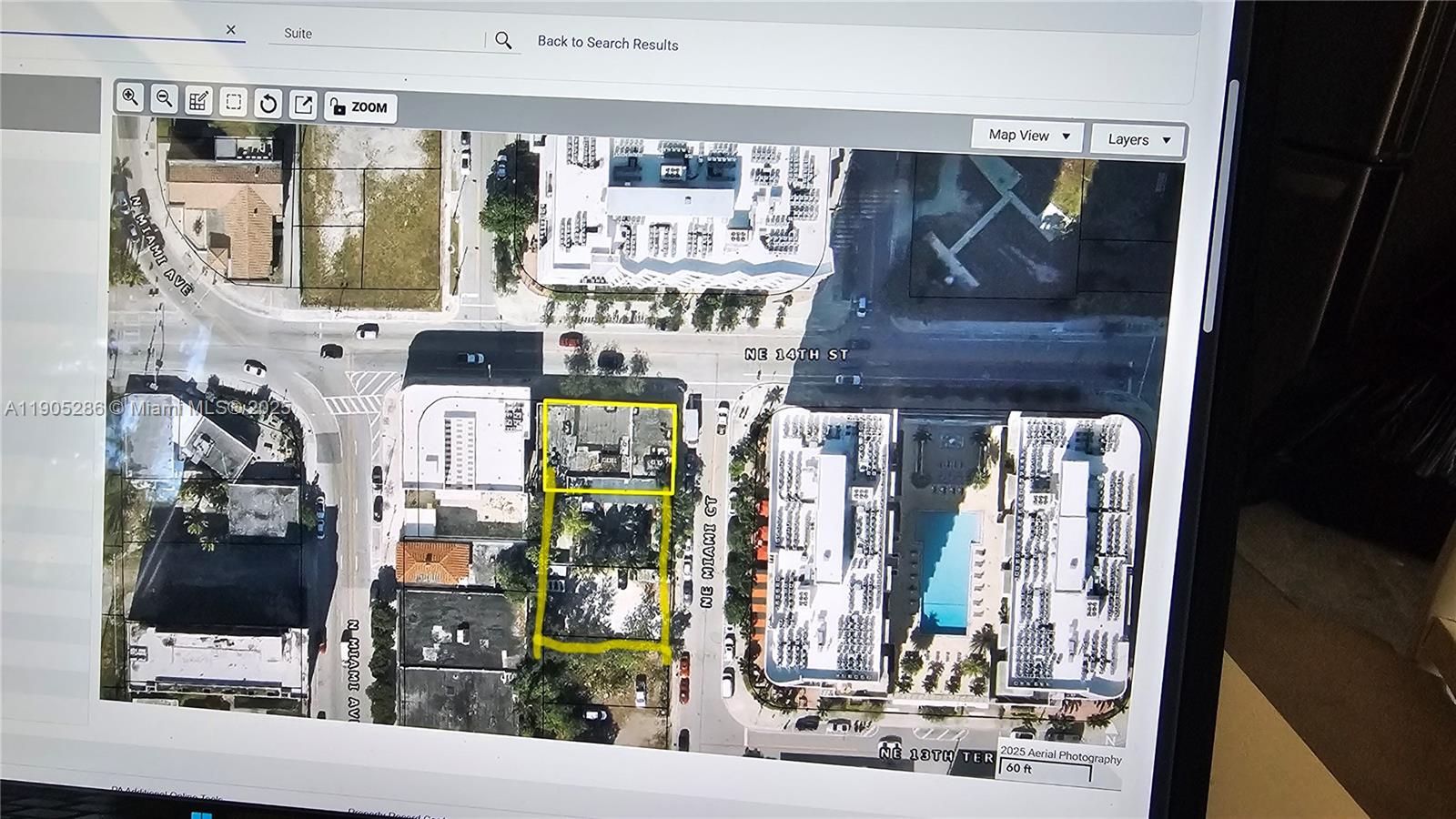 This is an aerial map view showing a highlighted property lot in an urban area — 30 NE 14 St, Miami FL 33132, MIAMI, FL