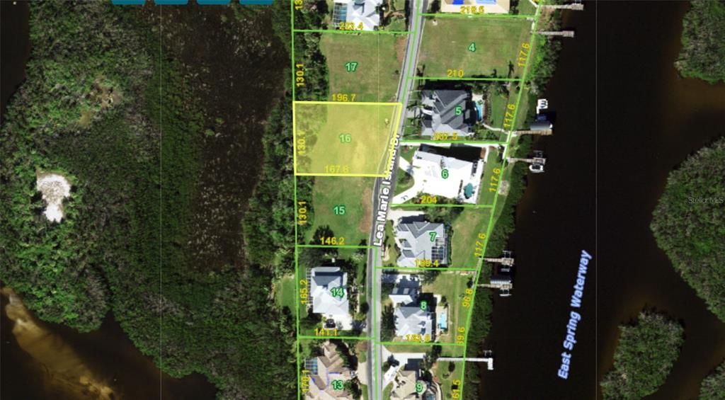 This is an aerial map showing a vacant residential lot highlighted in yellow along a waterway — 4041 LEA MARIE ISLAND DRIVE, PORT CHARLOTTE, FL
