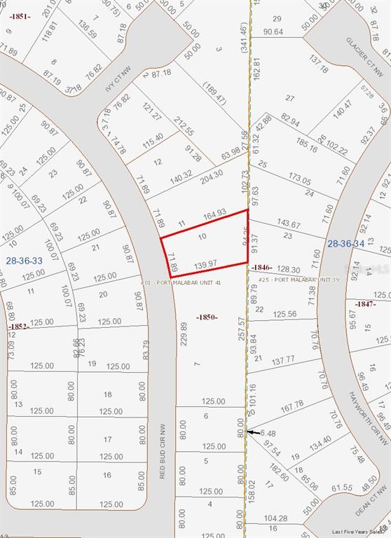 This is a plat map showing a highlighted parcel of land in a residential neighborhood — 1667 RED BUD CIRCLE NW, PALM BAY, FL