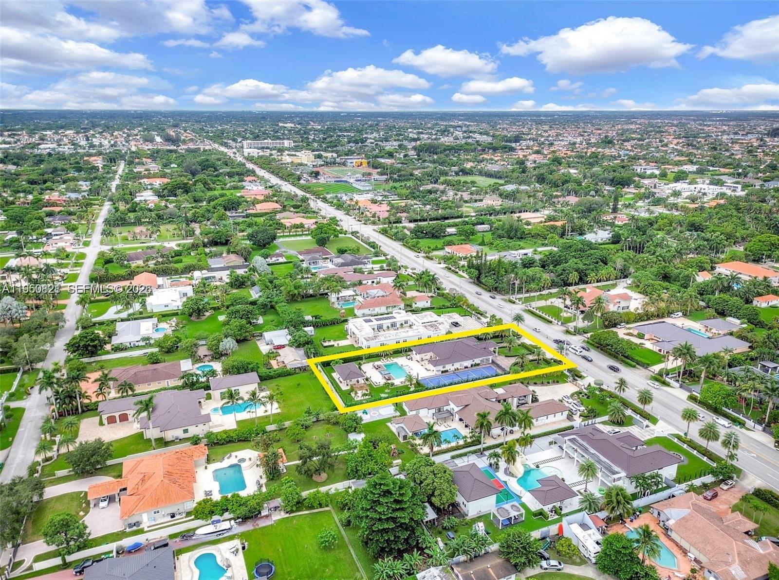 An aerial view shows a large residential property with a pool and tennis court — 433 NW 127th Ave, Miami FL 33182, MIAMI, FL