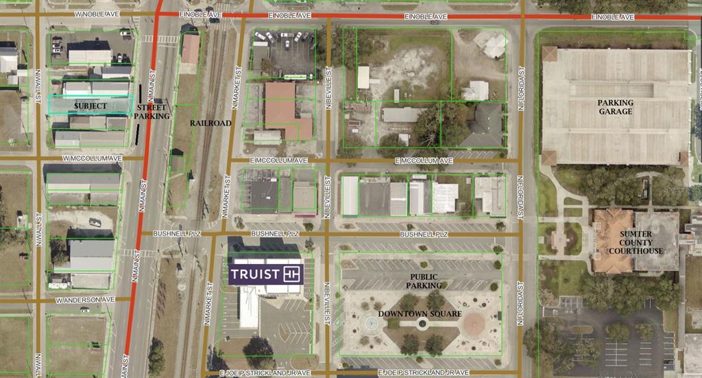 An aerial map shows a downtown area with streets, buildings, a parking garage, and courthouse — 232 N MAIN STREET, BUSHNELL, FL