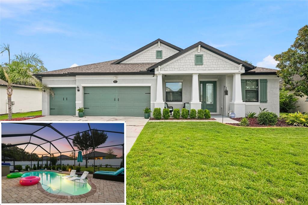 A single-story house with a green garage, front porch, and an inset photo of a pool — 652 TIERRA DRIVE, SPRING HILL, FL