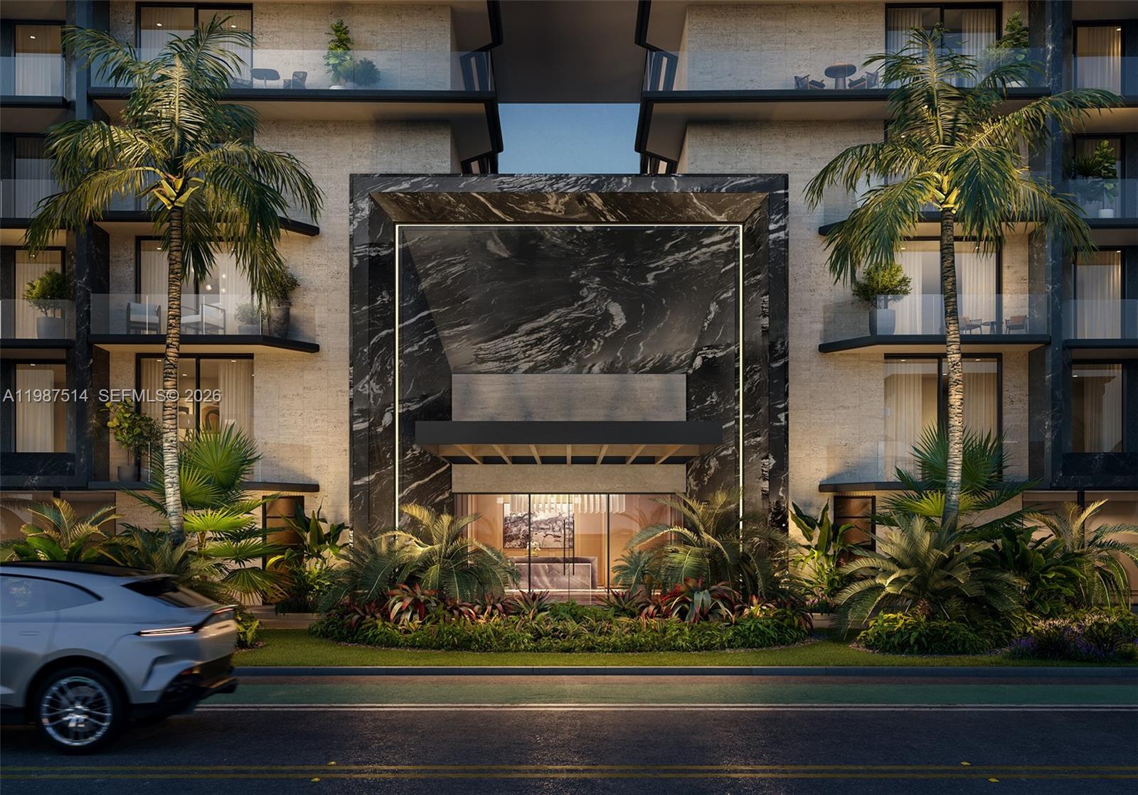 This architectural rendering shows the modern, marble-accented entrance of a multi-story residential building with landscaping — 10141 E Bay Harbor Drive # 703, Bay Harbor Islands FL 33154, BAY HARBOR ISLANDS, FL